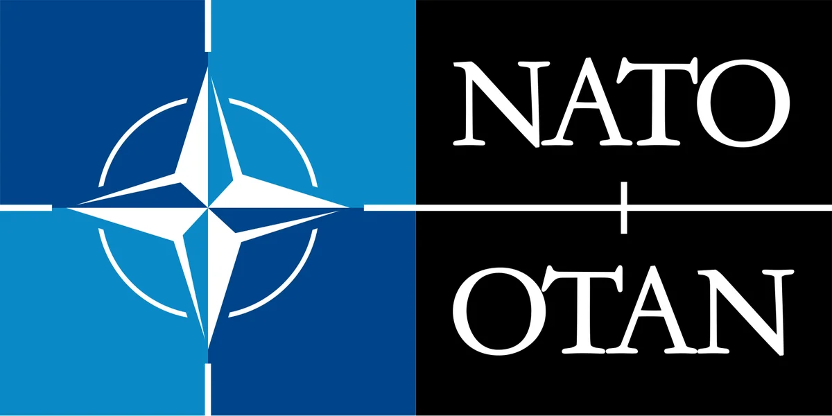 NATO logo — závazek 2 % HDP pro členské státy aliance