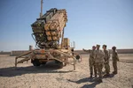 Patriot PAC-3 missile defense system launcher with U.S. Army soldiers