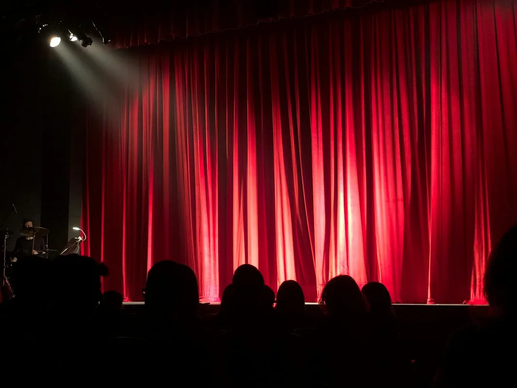 theater stage red curtain honoring Czech actor Jan Hraběta